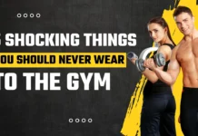 5 Gym Outfit Mistakes That Instantly Ruin Your Workout Fitness graphic showing a muscular man and woman with dumbbells against a black and yellow background, overlaid with the text: "5 SHOCKING THINGS YOU SHOULD NEVER WEAR TO THE GYM."